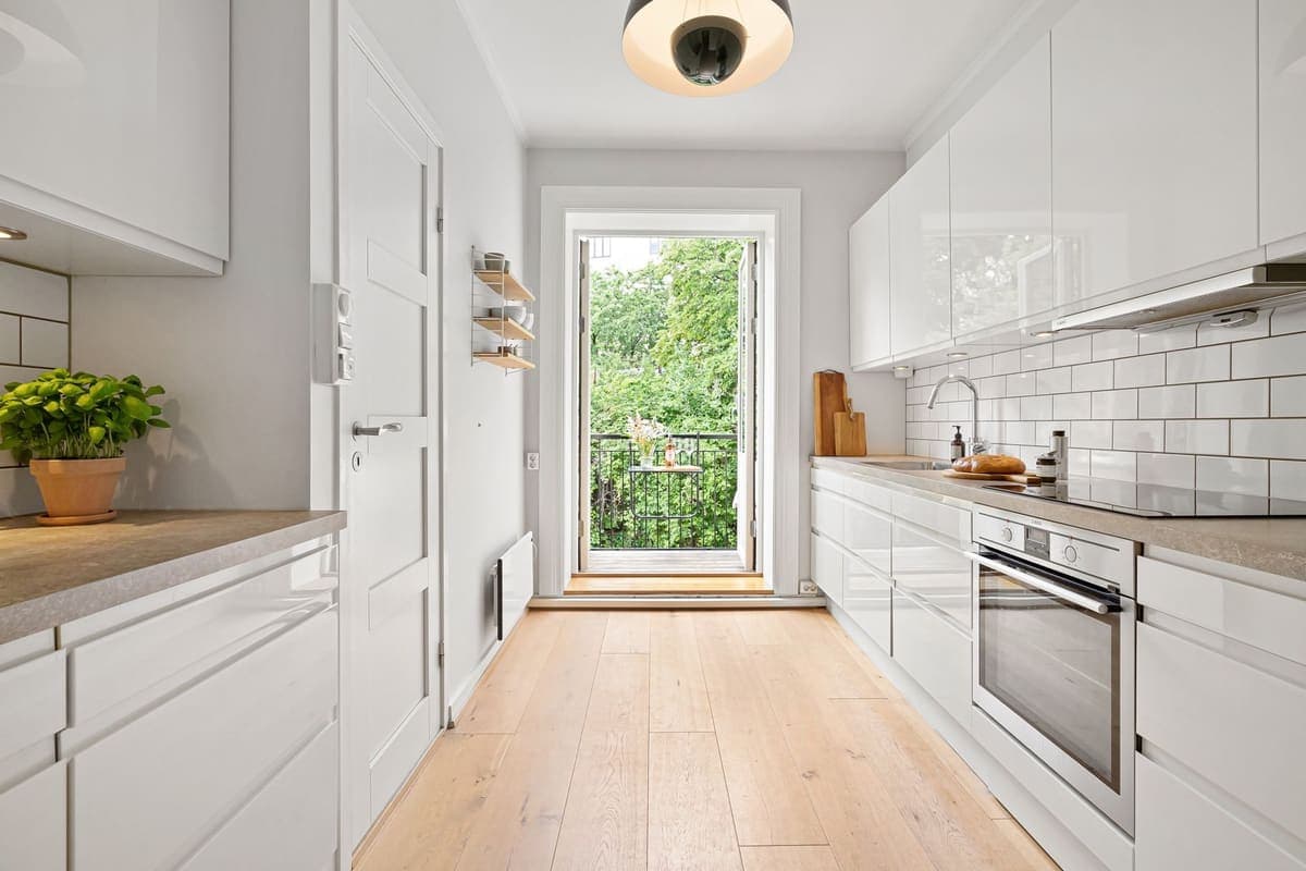 Simple white galley kitchen