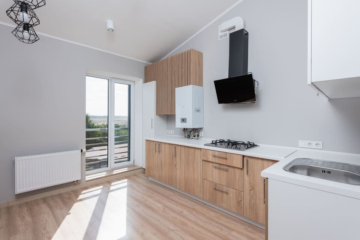 Modern kitchen cabinets and counter in daylight