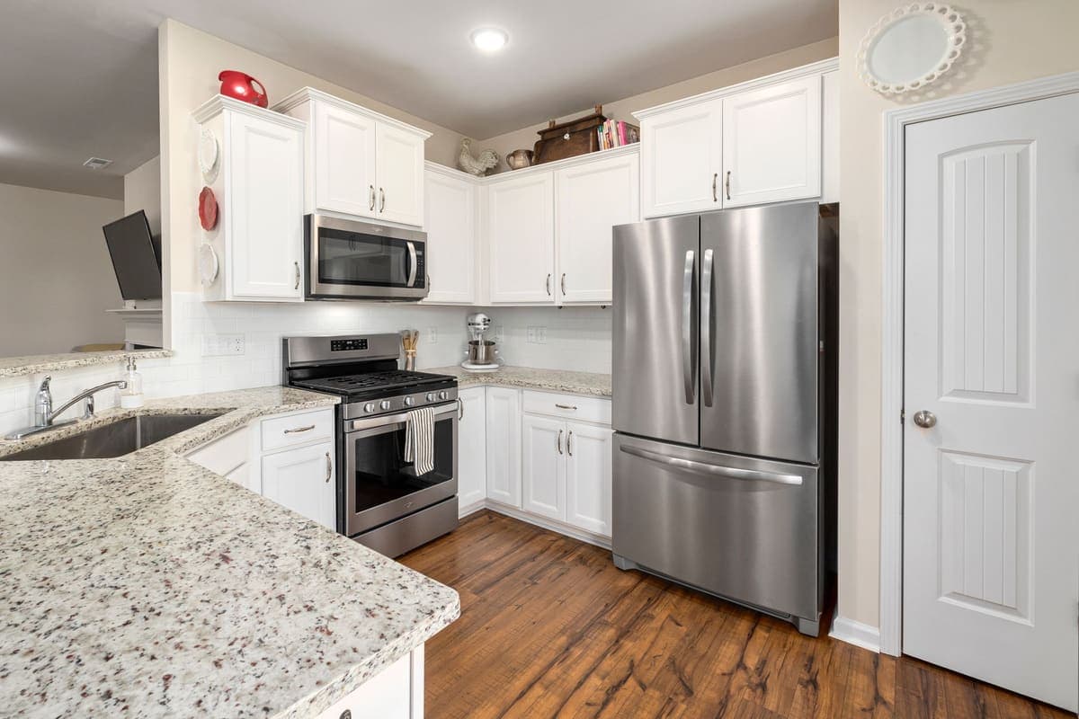 Kitchen with brushed stainless steel appliances