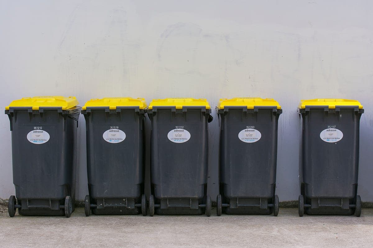 Row of waste containers of different sizes