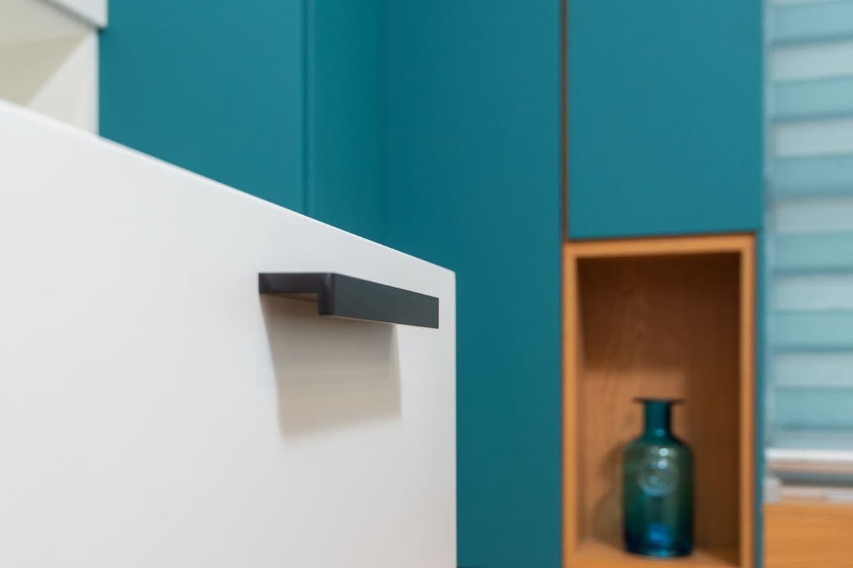 Modern kitchen cabinetry with a closed drawer front