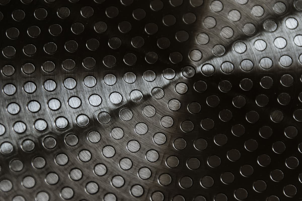 Brushed stainless steel surface with a visible grain
