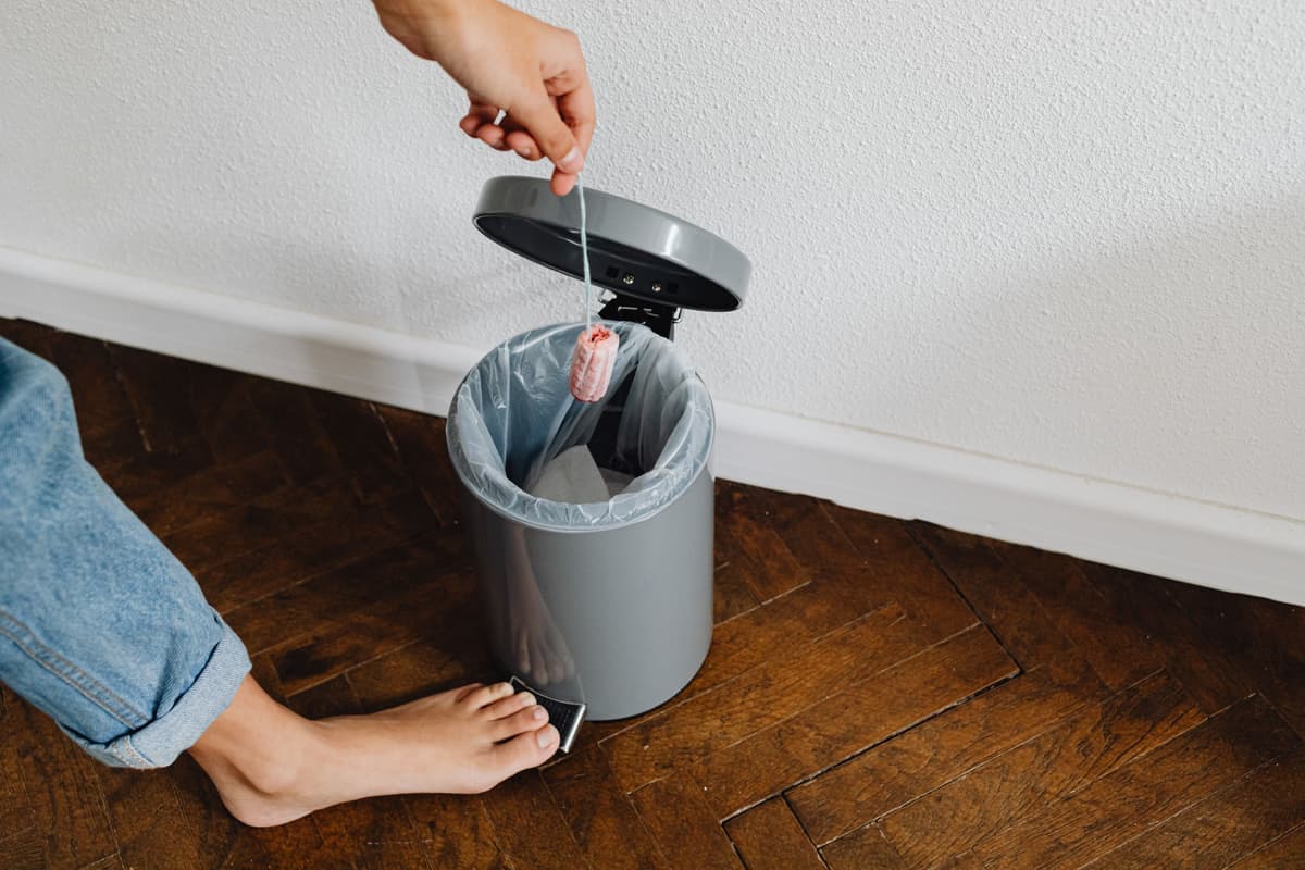 Foot pedal on a metal kitchen trash can